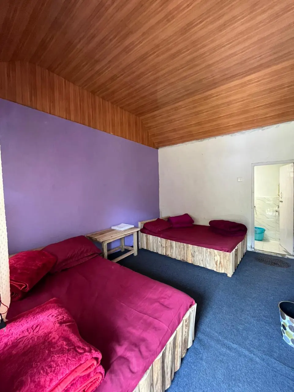 Spacious and comfortable rooms at Manokamna Homestay Tabakoshi